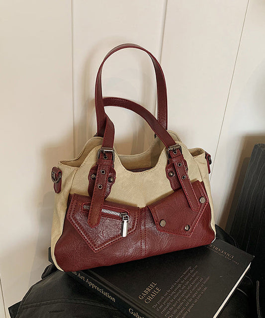 Moderne Henkeltasche aus Kunstleder mit Nieten-Patchwork-Taschen