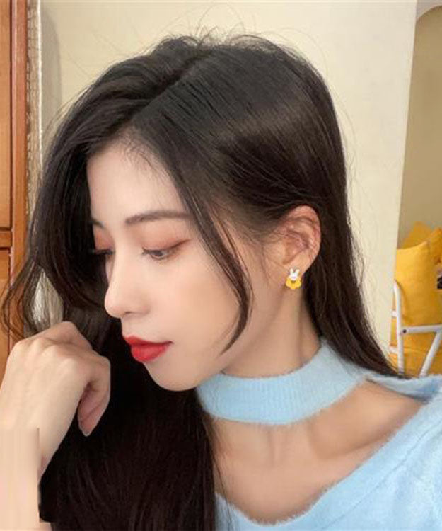 Pendientes asimétricos de conejo con diseño floral de aleación de plata de ley.