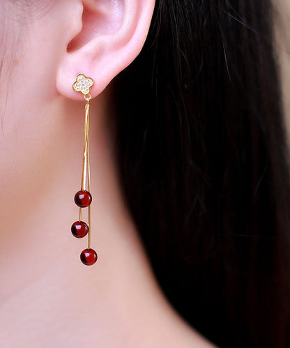 Moderne Tropfenohrringe aus gelbem Sterlingsilber mit eingelegtem Bernstein und Bienenwachs