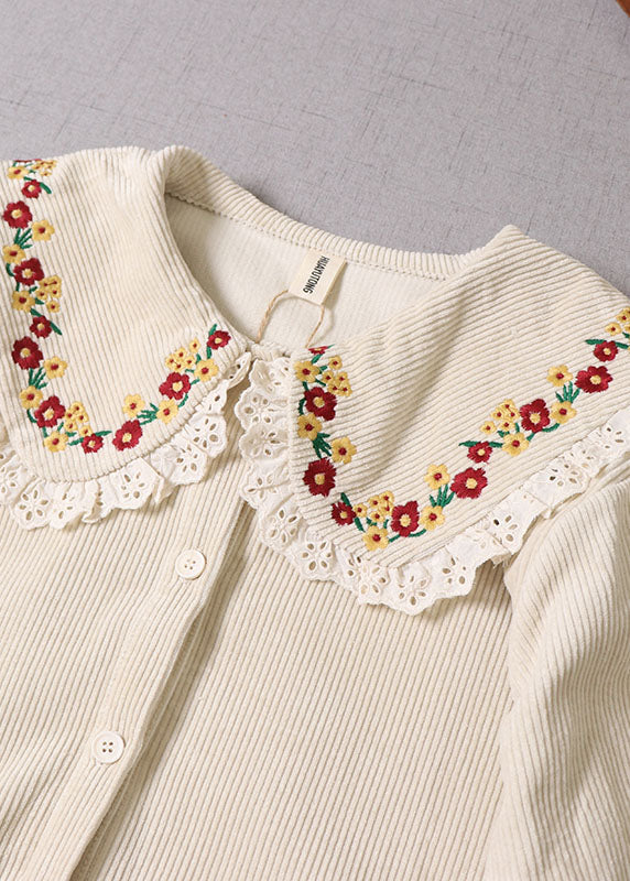 Naturbeiger Wintermantel aus Cord mit Blumenstickerei