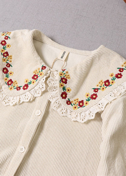 Naturbeiger Wintermantel aus Cord mit Blumenstickerei