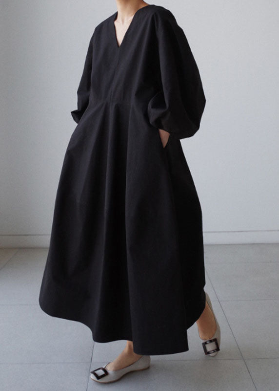 Naturschwarzes Partykleid aus Baumwolle mit V-Ausschnitt und Laternenärmeln