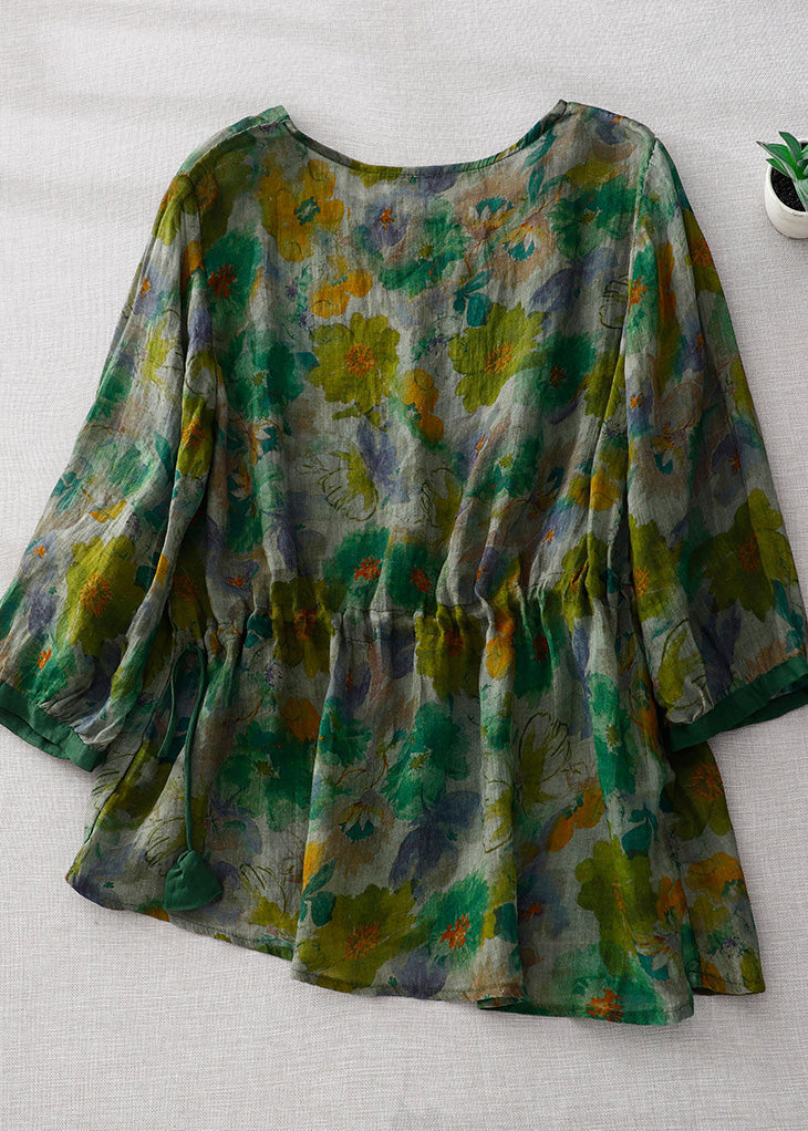 Blusa de lino arrugada con cuello redondo y estampado verde natural de manga larga