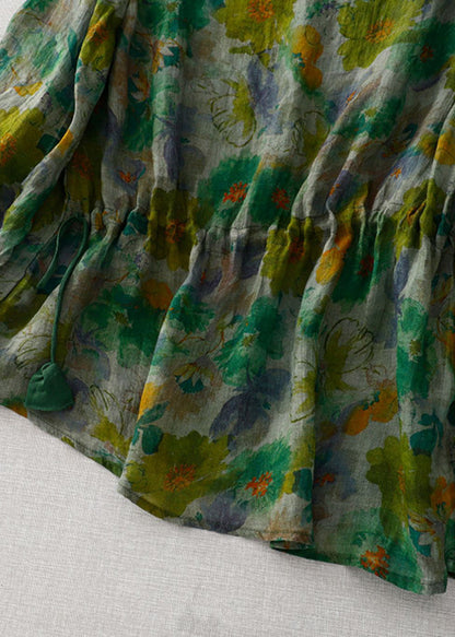 Blusa de lino arrugada con cuello redondo y estampado verde natural de manga larga