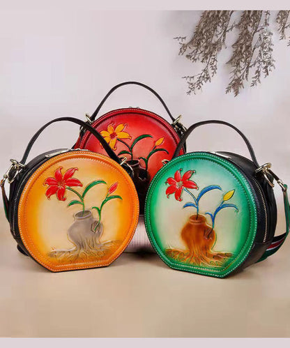 Handtasche aus Kalbsleder mit Prägung in Naturgelb