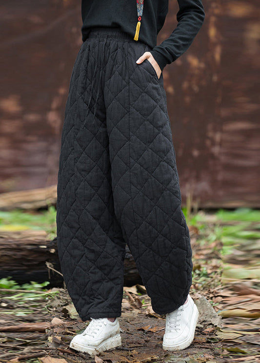 Pantalones negros de cintura alta con bolsillos y relleno de algodón