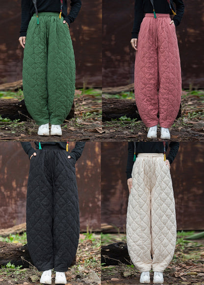 Pantalones negros de cintura alta con bolsillos y relleno de algodón