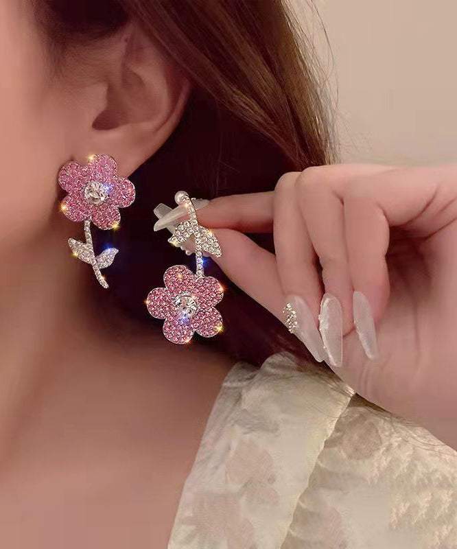 Nuevos y modernos pendientes con borlas de cristal y flores de organza rosa.