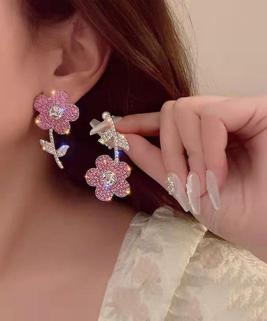 Nuevos y modernos pendientes con borlas de cristal y flores de organza rosa.