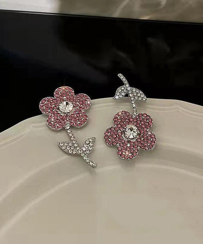 Nuevos y modernos pendientes con borlas de cristal y flores de organza rosa.