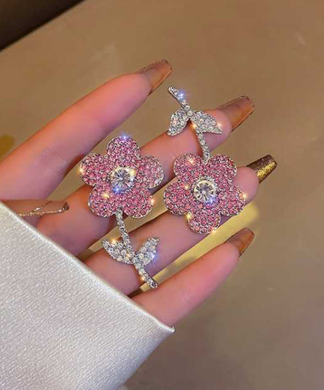 Nuevos y modernos pendientes con borlas de cristal y flores de organza rosa.