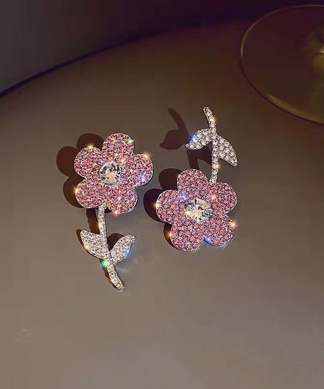 Nuevos y modernos pendientes con borlas de cristal y flores de organza rosa.