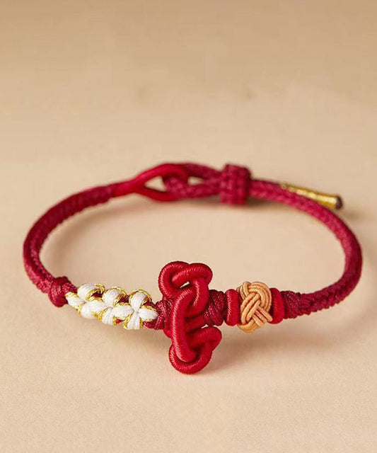 Nueva pulsera con dijes de la marca Fu tejida a mano en color verde claro