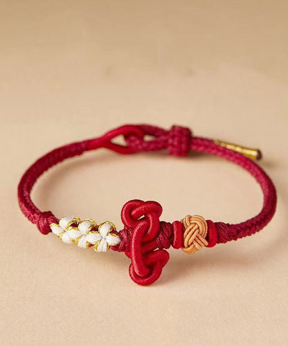 Nueva pulsera con dijes de la marca Fu tejida a mano en color verde claro