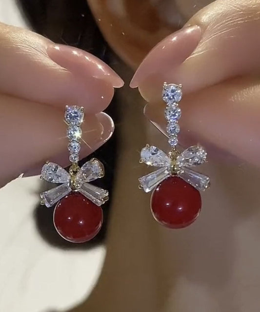 Nuevos pendientes colgantes con lazo de perla y circonita de aleación de morera