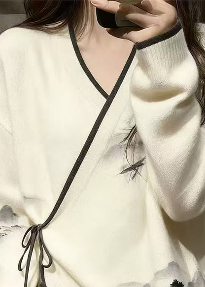 Neuer weißer Strickpullover mit V-Ausschnitt und Schnürung im Frühlingsstil mit Landschaftsmotiv