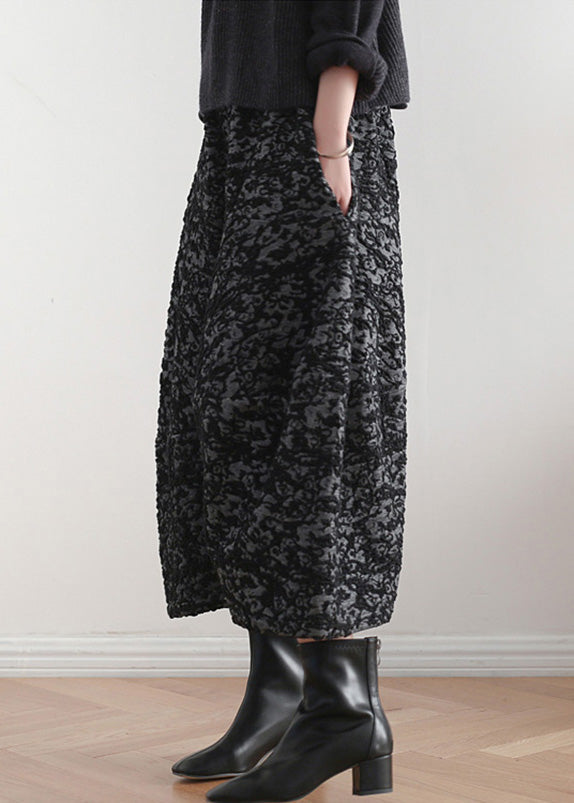 Pantalones harén con cintura elástica y estampado negro novedoso