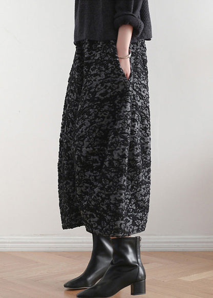 Pantalones harén con cintura elástica y estampado negro novedoso