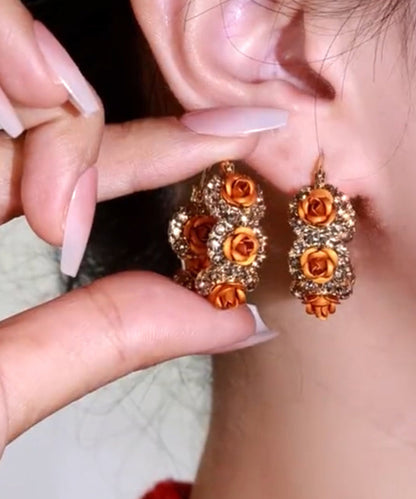 Pendientes de aro con circonitas rosas y aleación de oro champán novedosos