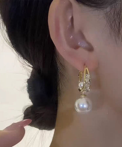 Neuartige Ohrringe mit vergoldeten Perlen und Zirkonia in Gold-Kupfer-Optik