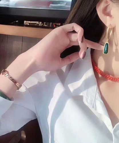 Pendientes colgantes de jade verde en plata de ley novedosos