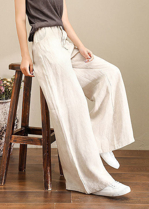 Pantalones rectos de lino con cintura elástica y estampado naranja de verano con cordón ajustable de color liso