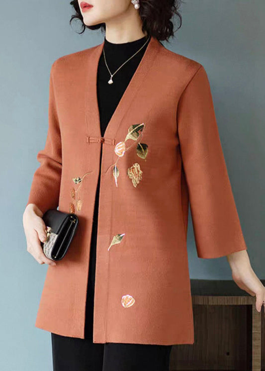 Cárdigan de lana con cuello en V y botones estampados en naranja para primavera