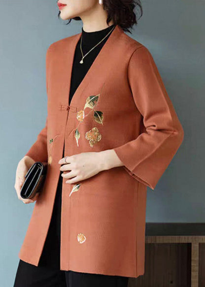 Cárdigan de lana con cuello en V y botones estampados en naranja para primavera