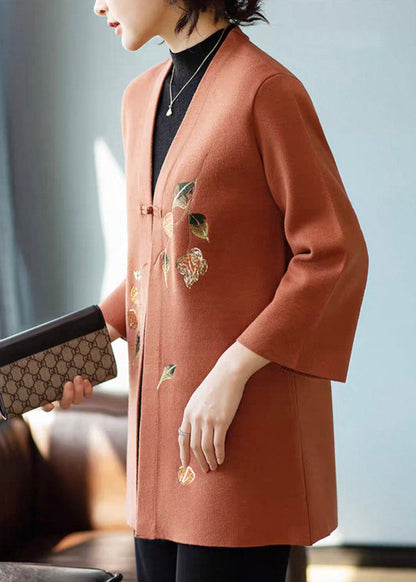 Cárdigan de lana con cuello en V y botones estampados en naranja para primavera