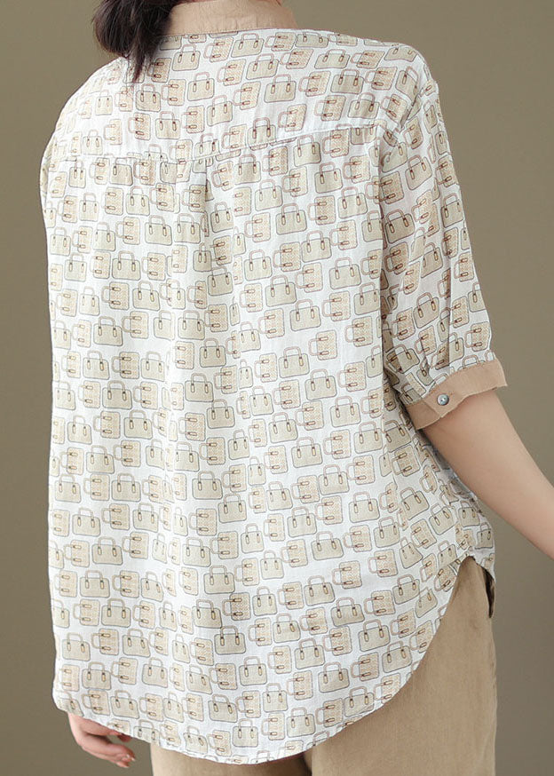 Top de lino orgánico beige con cuello Peter Pan y botones de patchwork para verano