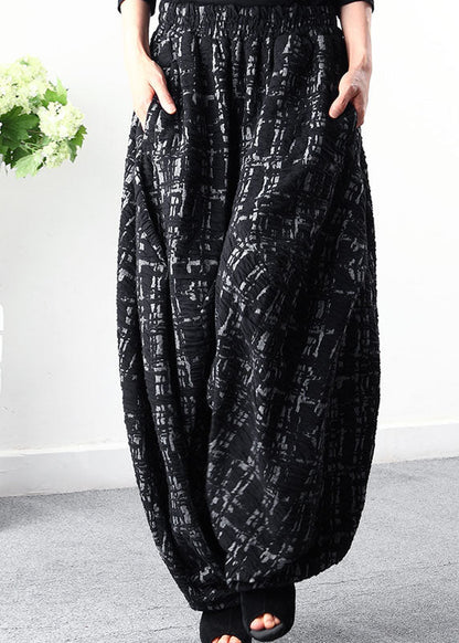 Oversize-Winterhose mit weitem Bein und Karomuster in Schwarz aus Bio-Baumwolle