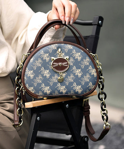 Bolso redondo de piel sintética con estampado azul orgánico