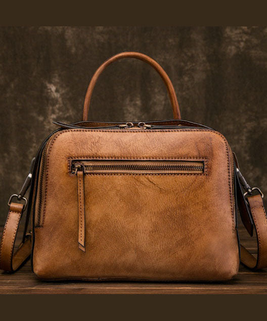 Umhängetasche aus Bio-Kalbsleder mit Blumenmuster in Gelbbraun