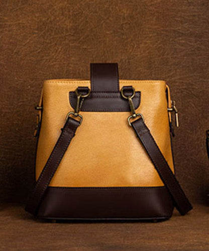 Umhängetasche aus organischem Kalbsleder mit gelben Blumenmustern