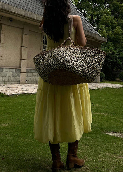 Langes, ärmelloses, einfarbiges, ärmelloses Bio-Kleid von O-Nec im Patchwork-Stil in Gelb.