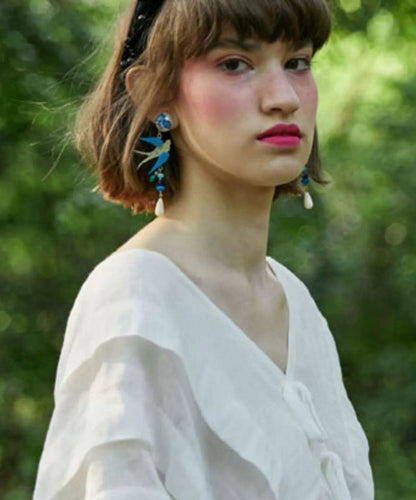 Pendientes colgantes de pájaro en vuelo de aleación azul con diseño original