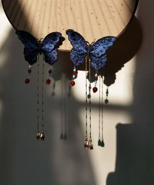 Horquilla con borla de mariposa bordada con sobredorado en plata de ley azul de diseño original