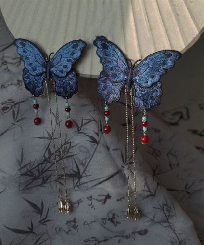 Horquilla con borla de mariposa bordada con sobredorado en plata de ley azul de diseño original