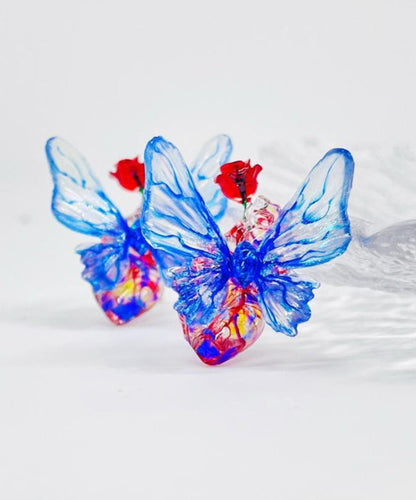 Pendientes de mariposa de resina en plata de ley con diseño original en bloques de color