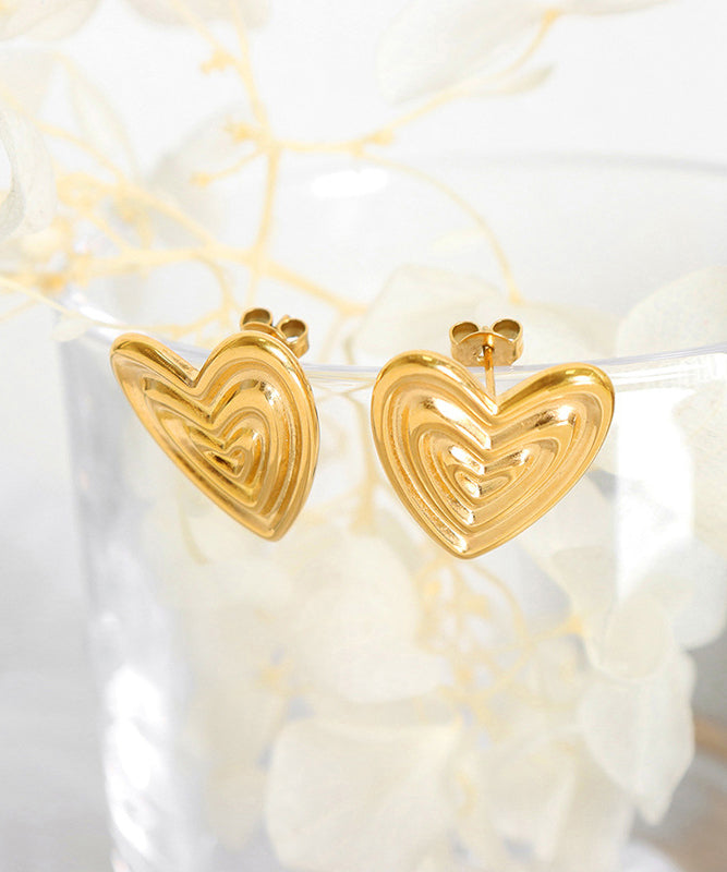 Pendientes de botón en forma de corazón de oro de 14 quilates con diseño original