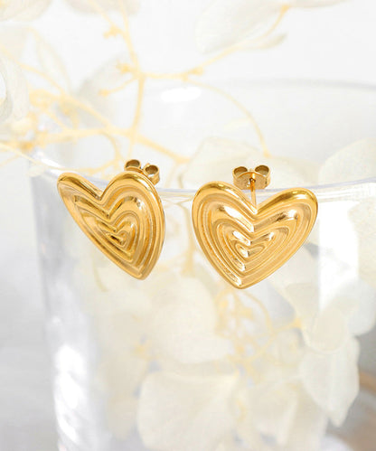 Pendientes de botón en forma de corazón de oro de 14 quilates con diseño original