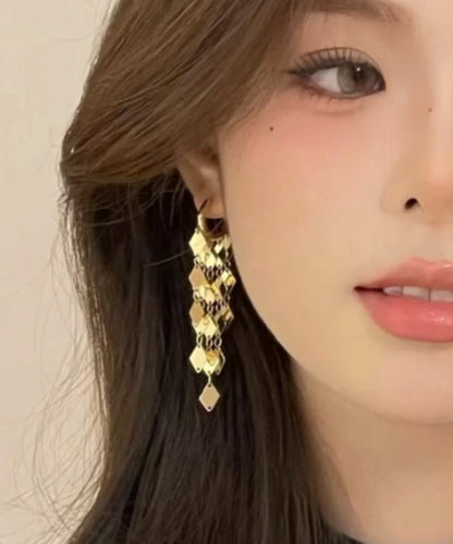 Ohrhänger aus Gold-Kupfer-Legierung mit Diamanten und Pailletten im originellen Design