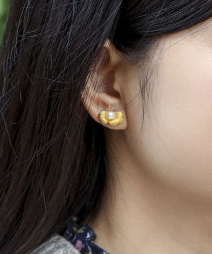 Pendientes de mariposa con perla y diseño original de cobre dorado