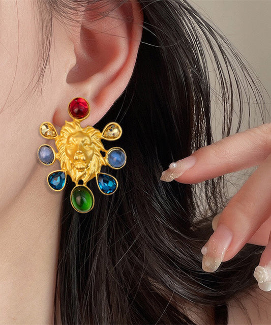 Pendientes de plata de ley con diseño original, incrustaciones de oro y esmalte coloreado.