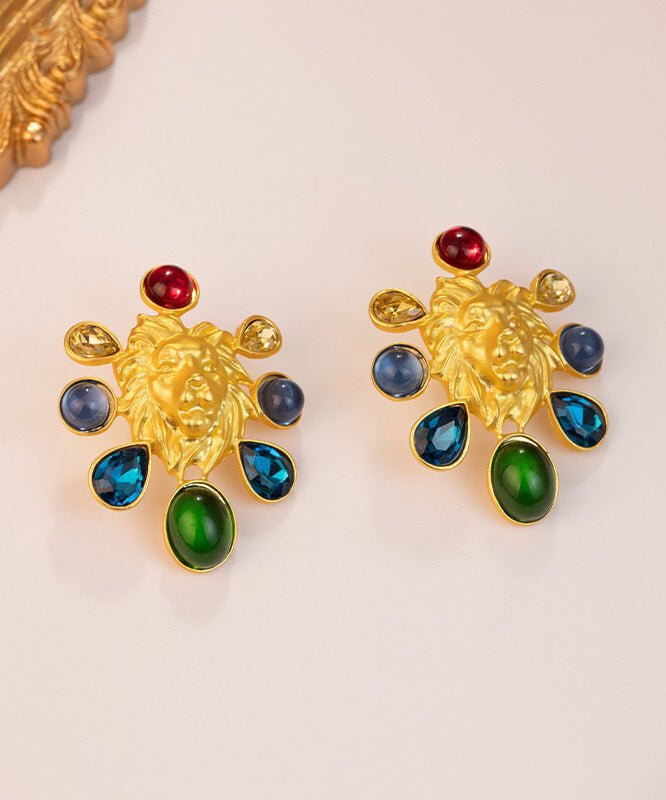 Pendientes de plata de ley con diseño original, incrustaciones de oro y esmalte coloreado.