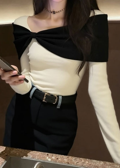 Suéter de punto con diseño original de patchwork y lazo blanco para invierno