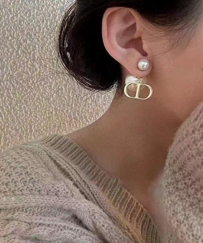 Original Design White Copper Alloy Pearl Graphic Stud Earrings