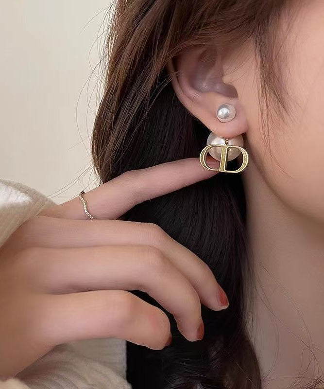 Original Design White Copper Alloy Pearl Graphic Stud Earrings