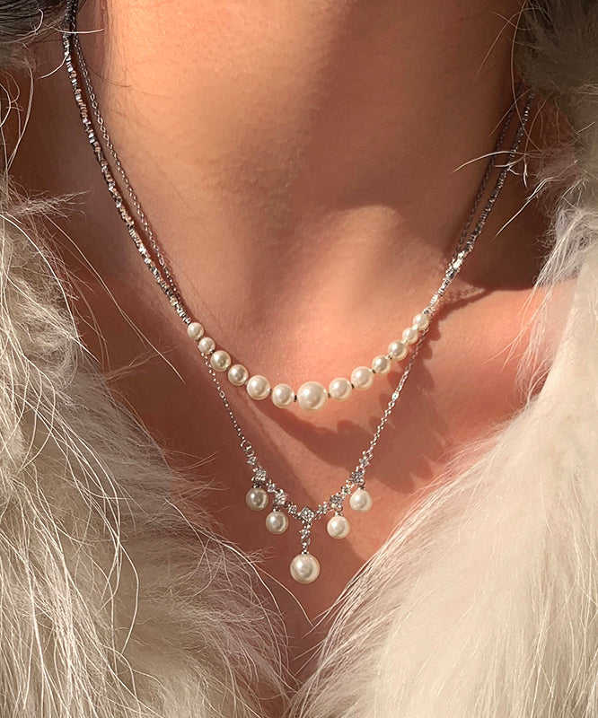 Collar con colgante de borla de perla de cristal y cobre blanco dorado, diseño original