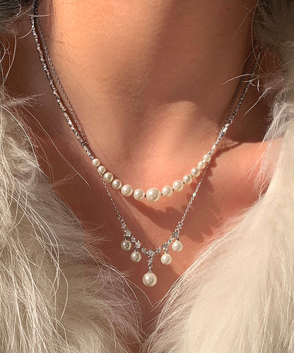 Collar con colgante de borla de perla de cristal y cobre blanco dorado, diseño original